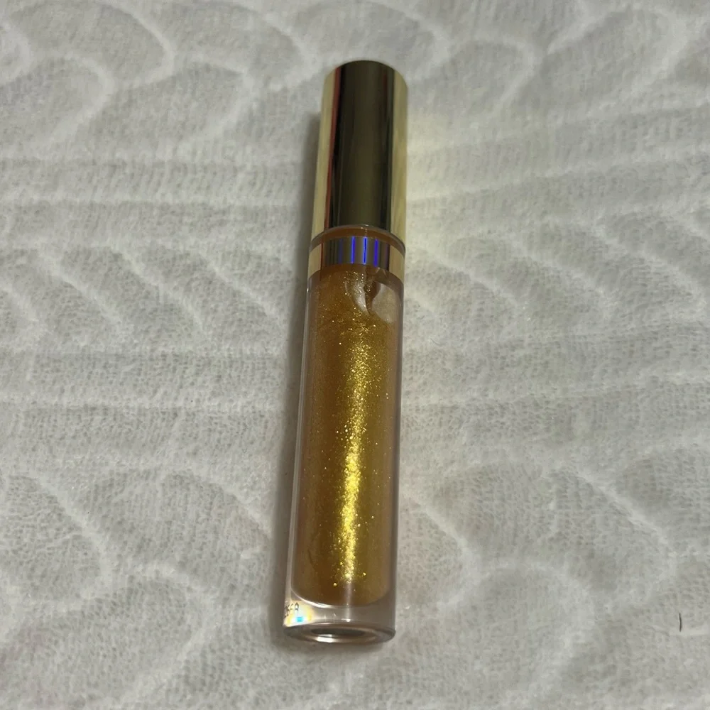 🖤 FREE 🖤‎ Shared Planet - Gold Lip Gloss